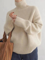 Women's cream turtleneck sweater with ribbed trims