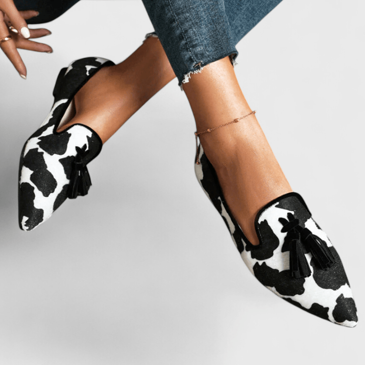 Women's pointed animal print loafers with front tassels