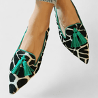 Women's pointed animal print loafers with front tassels