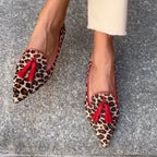 Women's pointed animal print loafers with front tassels
