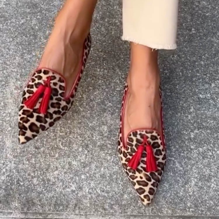 Women's pointed animal print loafers with front tassels