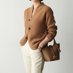 Women's textured knit cardigan with stand collar and button front