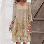 Women's embroidered floral midi dress with lace trim and three-quarter sleeves