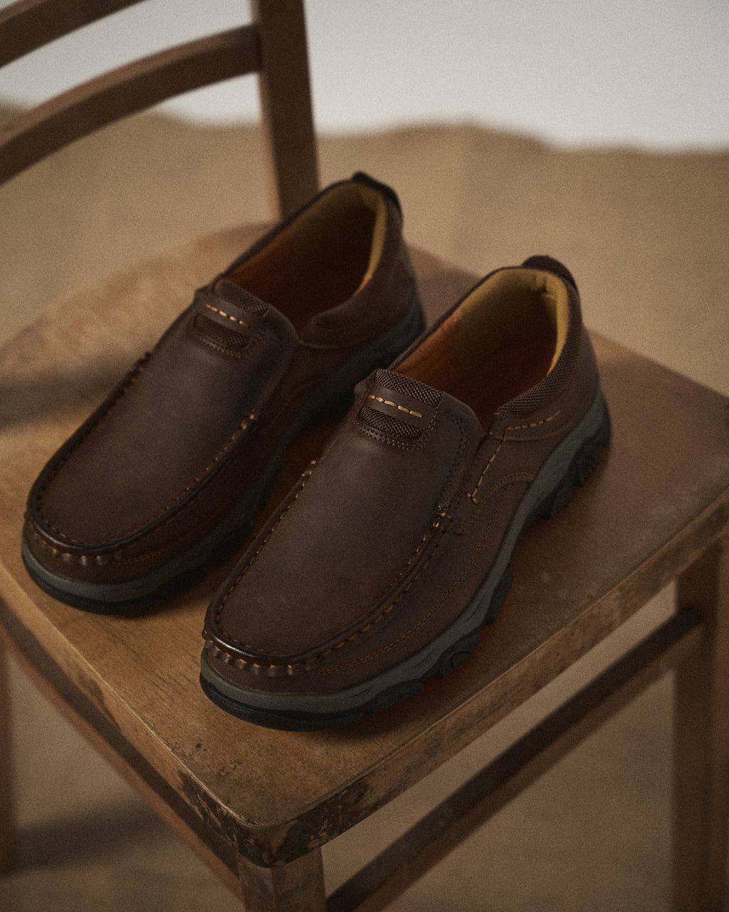 Men's casual moc toe loafers with chunky treaded soles