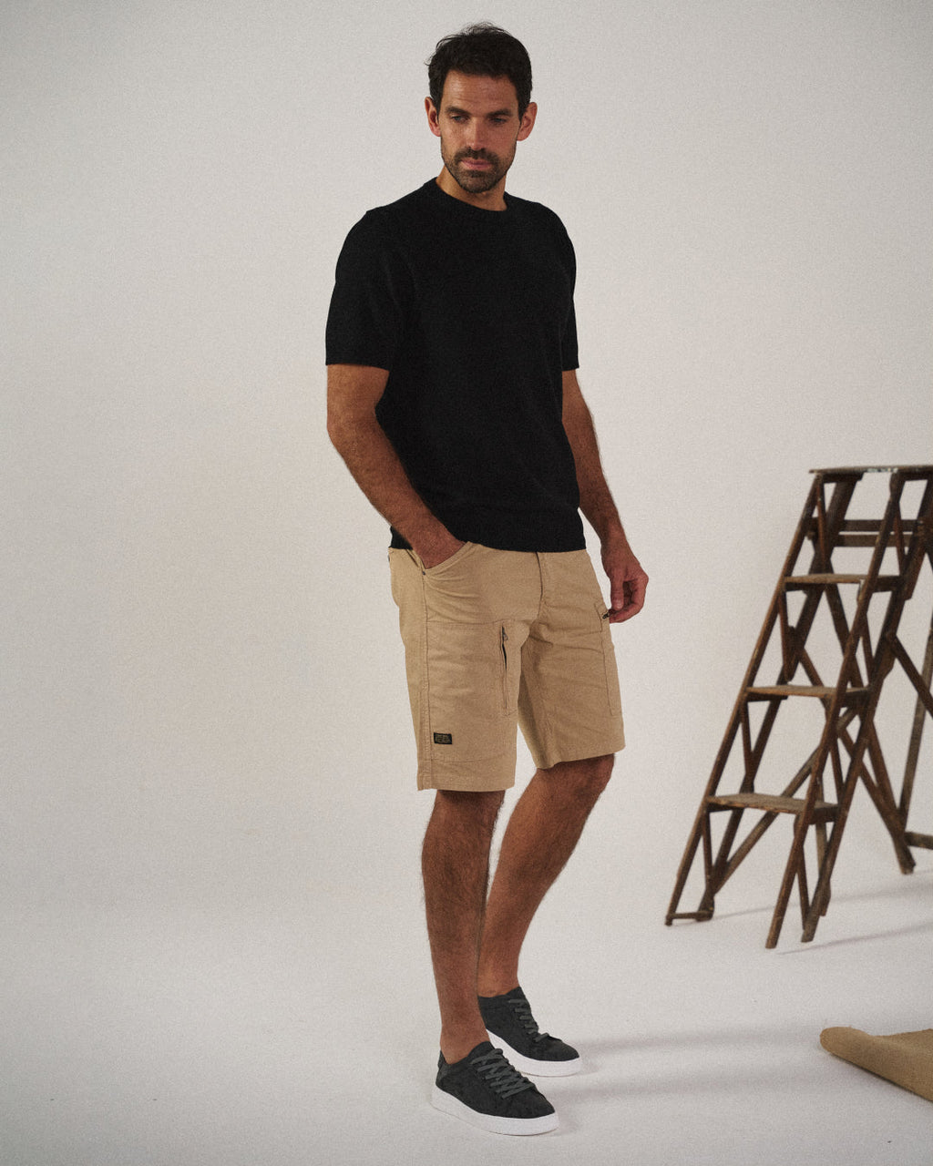 Knit barefoot-style slip-on shoes with textured panels and pull tabs