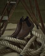 Ankle Chelsea boots with elastic side panels and pull tabs