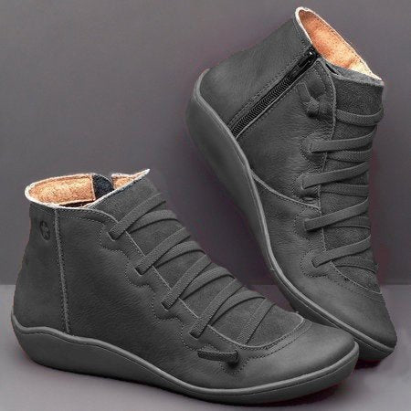 Women's high-top lace-up ankle boots with side zip, shown in green and blue colourways
