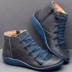 Women's high-top lace-up ankle boots with side zip, shown in green and blue colourways