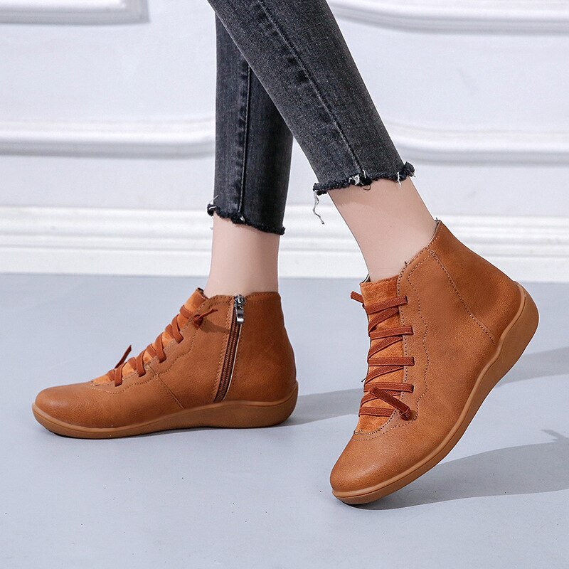 Women's high-top lace-up ankle boots with side zip, shown in green and blue colourways