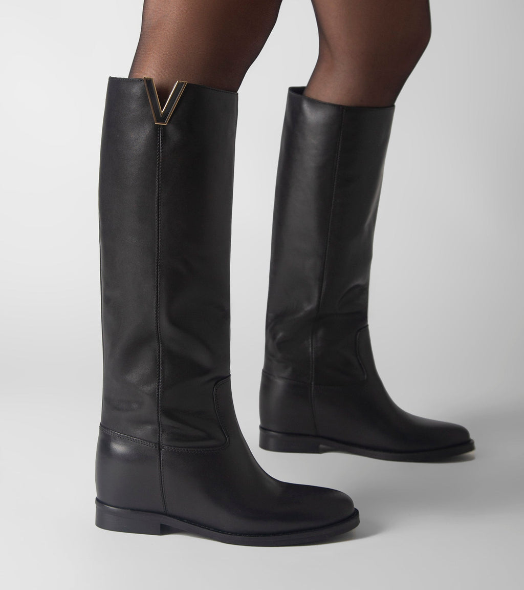 Women's black knee-high boots with V-cut topline