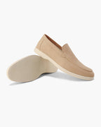 Unisex textured slip-on loafers with round toes and low wedge heels