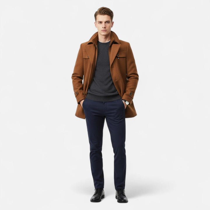 Men's long coat with stand collar, zip and button front, and multiple pockets