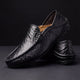 Moc toe slip-on loafers with stitched edging and low-profile sole