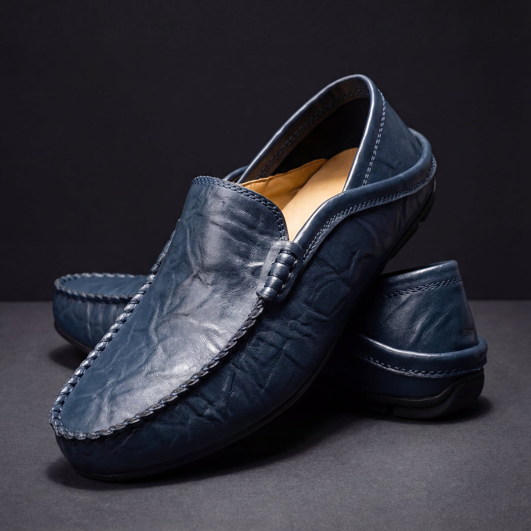 Moc toe slip-on loafers with stitched edging and low-profile sole