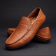 Moc toe slip-on loafers with stitched edging and low-profile sole
