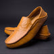 Moc toe slip-on loafers with stitched edging and low-profile sole