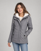 Women's hooded waterproof rain jacket with long sleeves, drawcord hood and front pockets