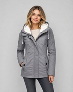 Women's hooded waterproof rain jacket with long sleeves, drawcord hood and front pockets