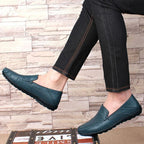 Men's slip-on leather loafers with rounded moc toe and stitched detailing