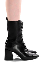 Women's black knee-high pointed toe lace-up boots with block heel