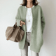 Women's longline button front cardigan with round neckline and long sleeves