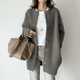 Women's longline button front cardigan with round neckline and long sleeves