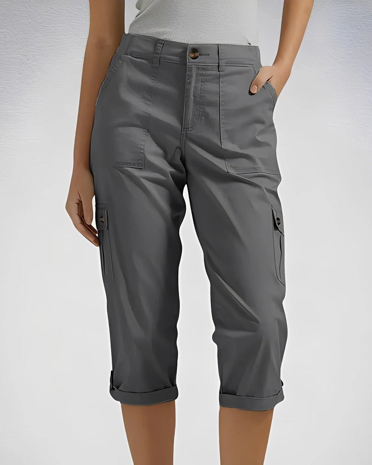 Women's high-waisted cropped cargo trousers with straight legs and multiple flap pockets