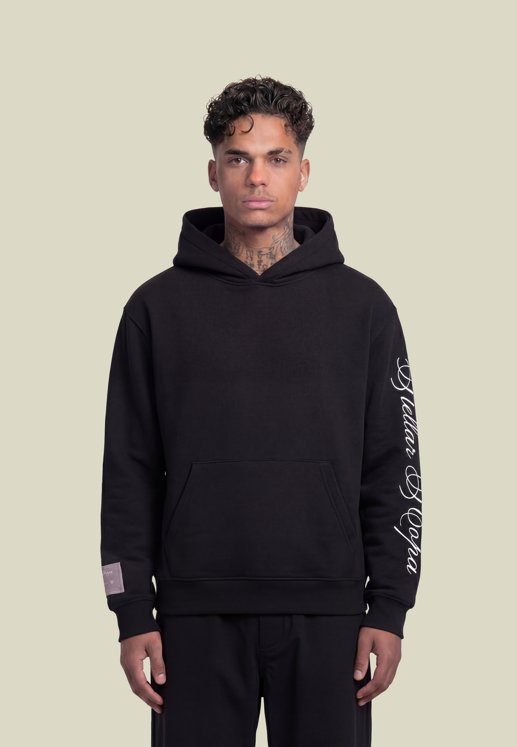 Black unisex pullover hoodie with sleeve lettering