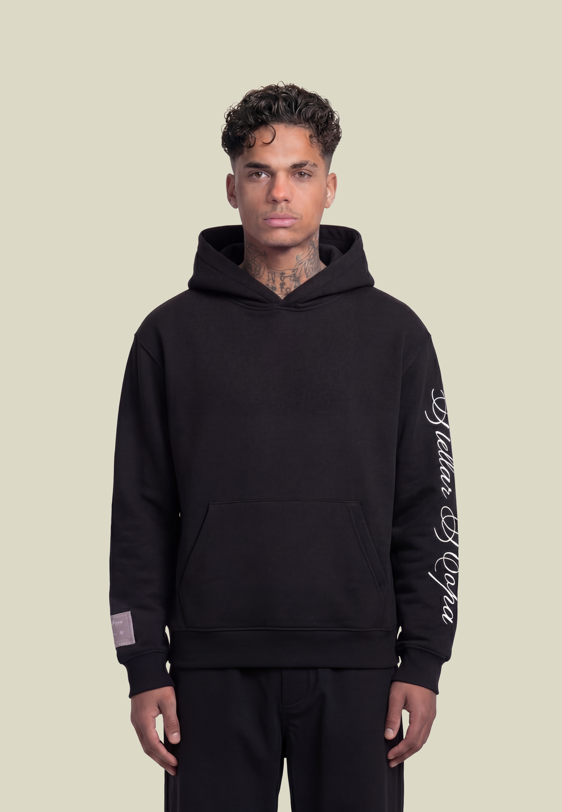 Black unisex pullover hoodie with sleeve lettering