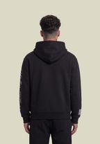 Black unisex pullover hoodie with sleeve lettering
