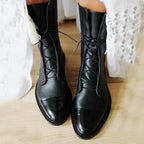 Women's knee-high lace-up boots with pointed toes and low heels