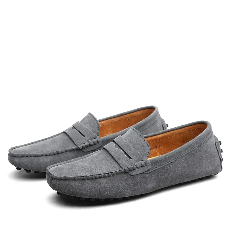 Men's suede loafers with moc toe stitching and flat soles