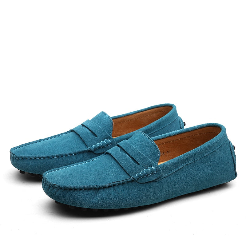 Men's slip-on penny loafers with moc toe stitching and strap detail