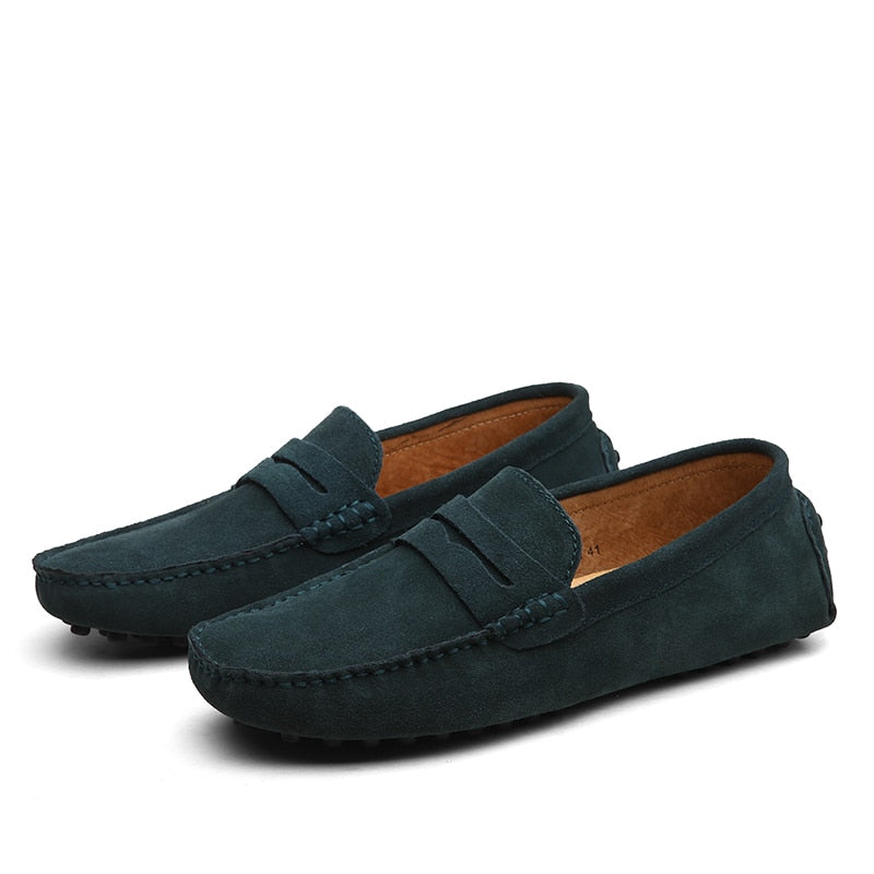 Men's slip-on penny loafers with moc toe stitching and strap detail