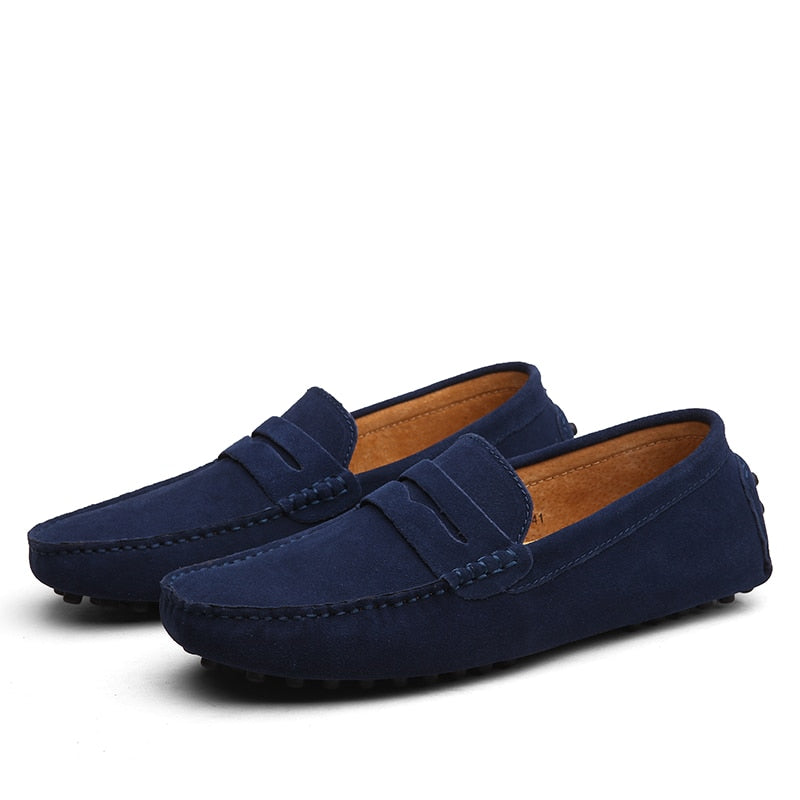 Men's slip-on penny loafers with moc toe stitching and strap detail