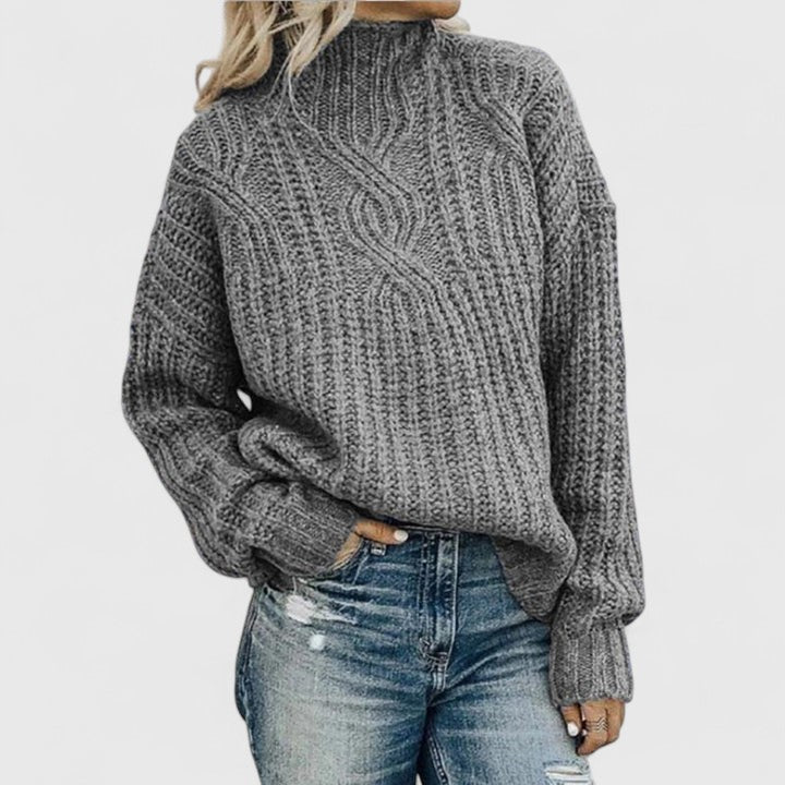 Women's cable knit sweater with mock neck and long sleeves