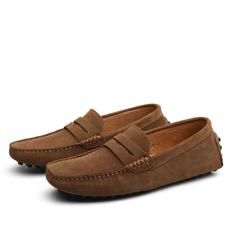 Men's slip-on penny loafers with moc toe stitching and strap detail