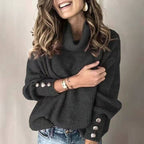 Women's ribbed turtleneck pullover with button cuff details