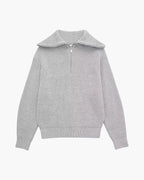 Striped ribbed knit sweater with mock neck and quarter zipper
