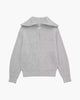 Striped ribbed knit sweater with mock neck and quarter zipper