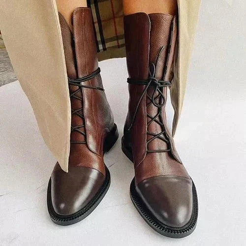 Women's knee-high lace-up boots with pointed toes and low heels