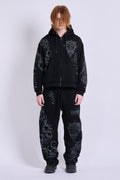 Black graphic zip hoodie with drawstring hood and long sleeves