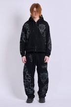 Black graphic zip hoodie with drawstring hood and long sleeves