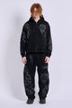 Black graphic zip hoodie with drawstring hood and long sleeves