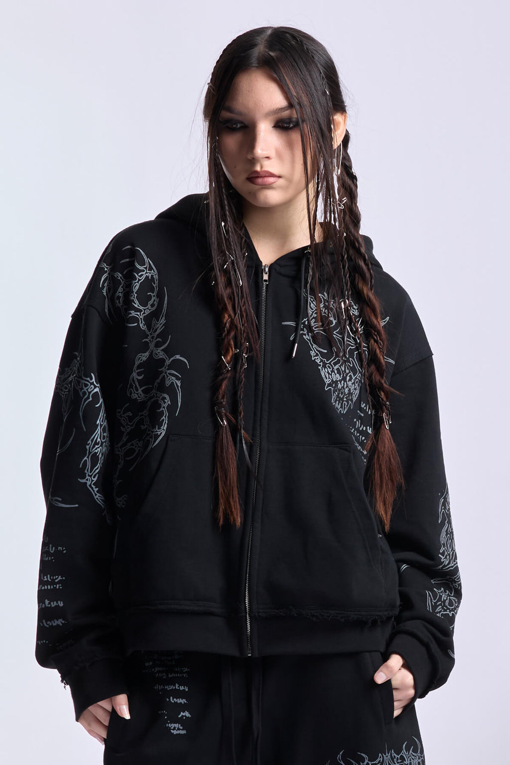 Black graphic zip hoodie with drawstring hood and long sleeves
