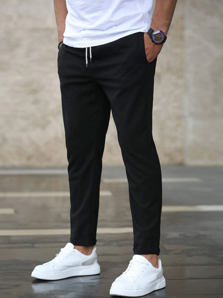 Men's slim fit jogger pants with drawstring waist and tapered cuff in grey