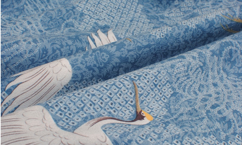 Women's blue crane print off-shoulder sweatshirt