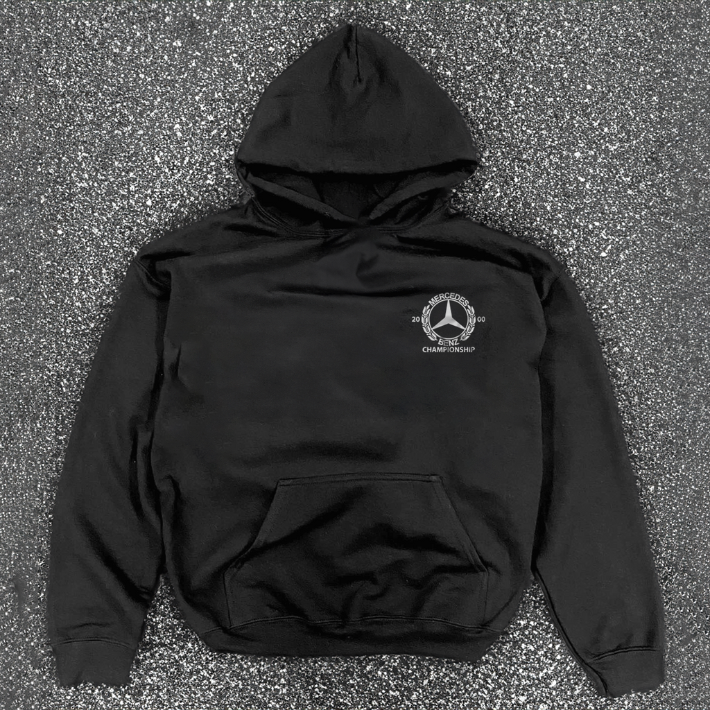 Black hooded hoodie with white Mercedes-Benz Championship chest logo and front kangaroo pocket