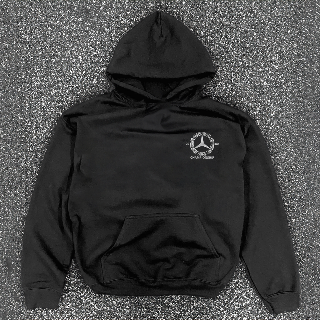 Black hooded hoodie with white Mercedes-Benz Championship chest logo and front kangaroo pocket