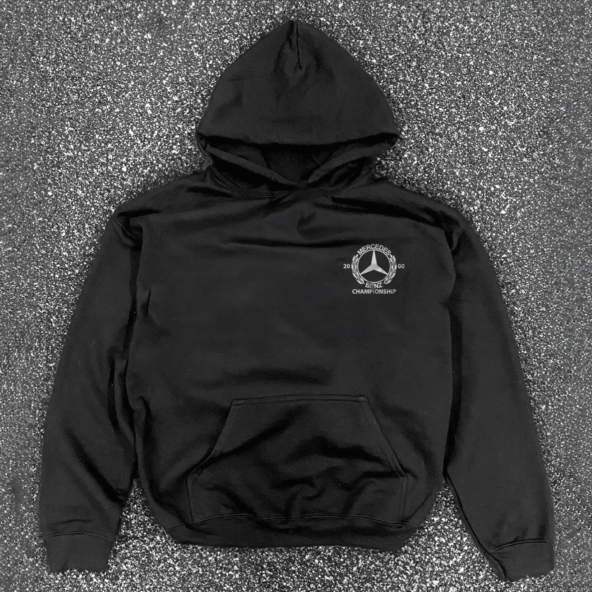 Black hooded hoodie with white Mercedes-Benz Championship chest logo and front kangaroo pocket